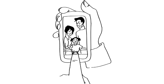 phone shows small girl and her parents, finger points to small girl