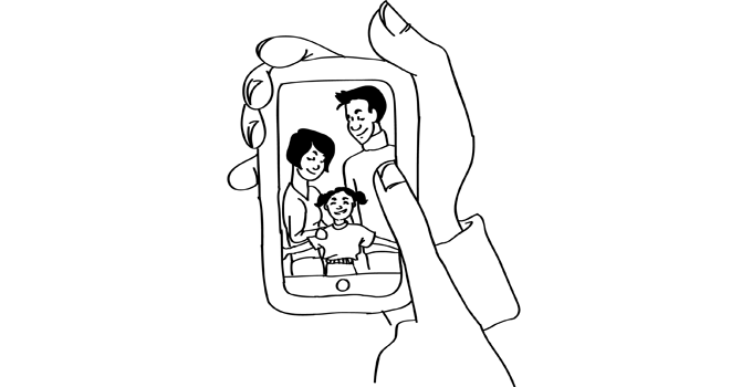 same picture, finger points to father