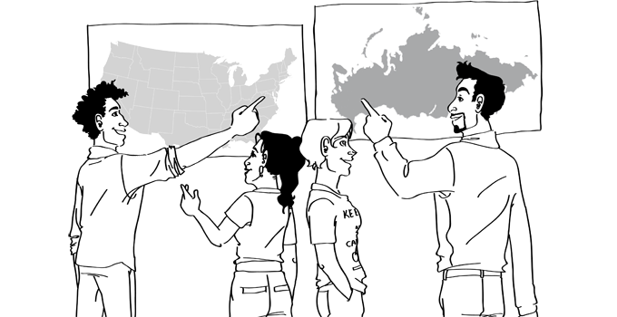 Our four American students in front of Russias & U.S. Maps